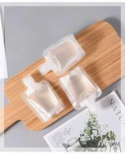 トラベルボトル 詰め替え容器 2個セット 30ml 50ml 80ml 100ml パウチ 液体 シャンプー 化粧水 日焼け止め 携帯 旅行 出張 トラベル お泊り ジム 温泉 持ち運び 便利