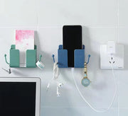スマホ充電スタンド スマホホルダー リモコンホルダー 壁掛け 粘着式 フック付き シンプル スマホ 携帯 リモコン 収納 リビング キッチン 台所 洗面所 壁 白 ピンク 青