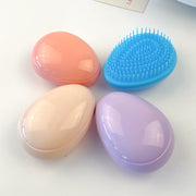 ヘアブラシ 単品 1個 くし 櫛 ヘアコーム ヘアケア用品 卵型 たまご型 円形 丸型 サークル 便利 携帯 外出 通学 通勤 旅行 デイリー コンパクト 持ち運び 持ち歩き かわいい シンプル