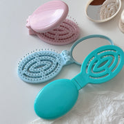 ヘアブラシ 折りたたみ ミラー付き 鏡 くし クシ 櫛 折り畳み コンパクト 円形 便利 携帯 外出 旅行 通勤 通学 デイリー 普段使い ヘアケア 頭皮ケア